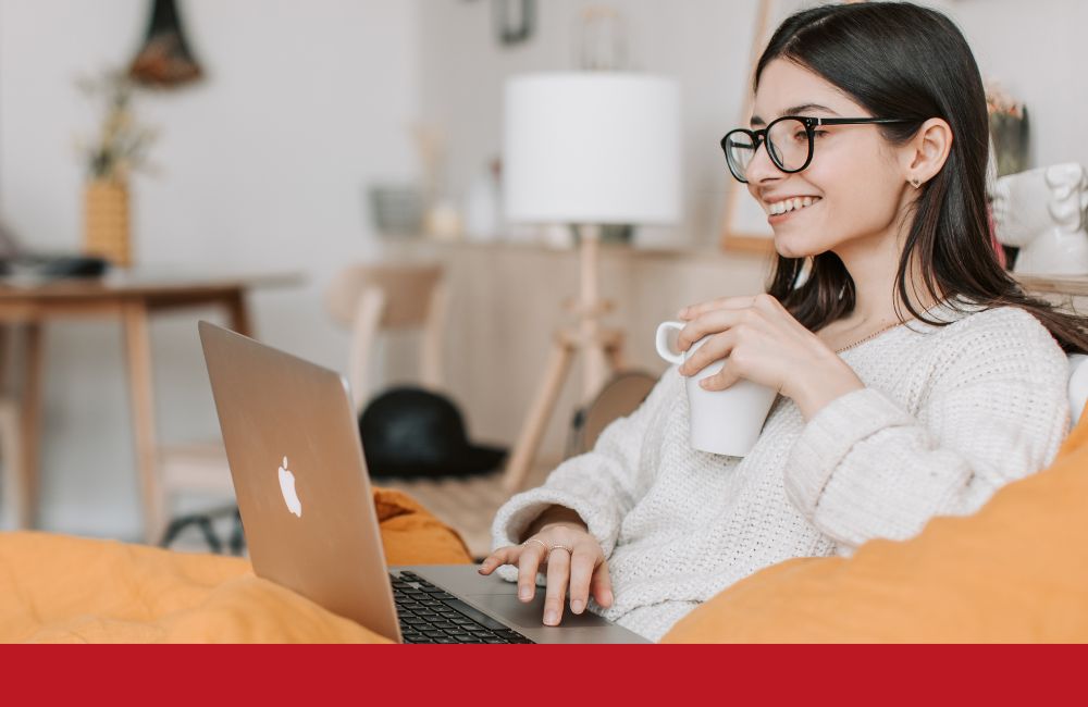 happy woman using laptop